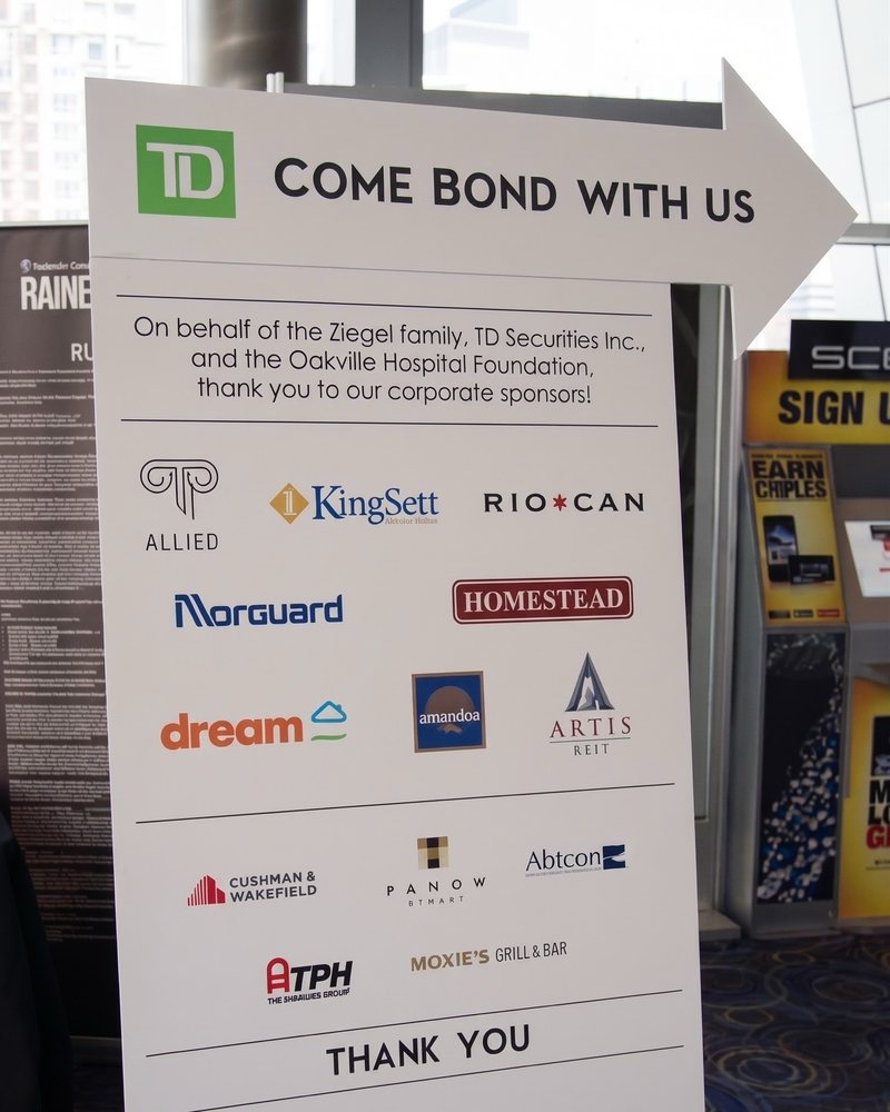 Come Bond With Us event sign thanking corporate sponsors